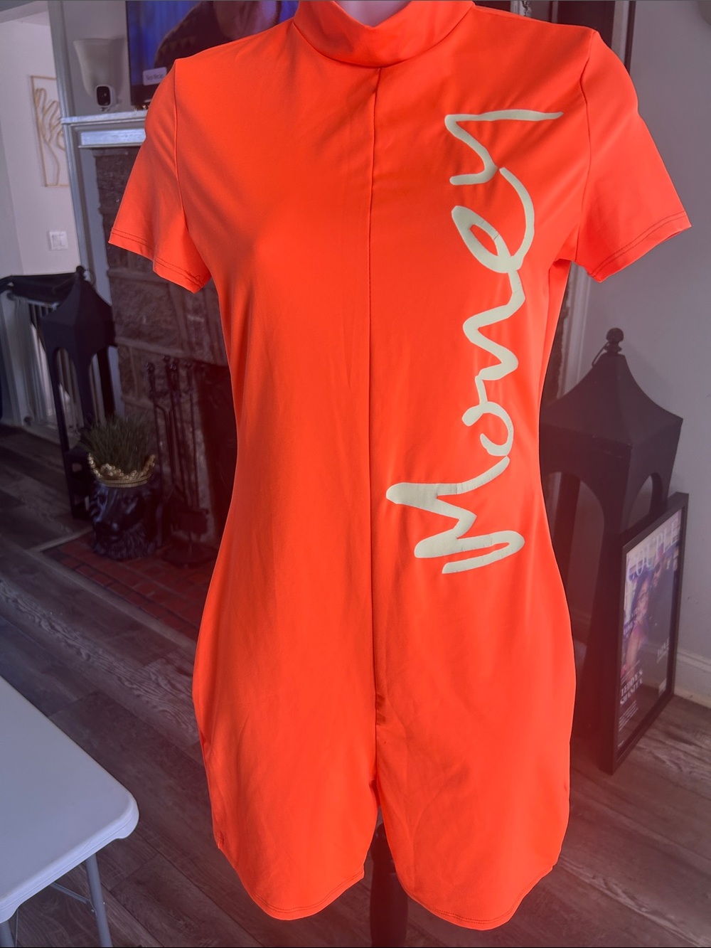 Fashion Nova Orange Short Sleeve Romper with Side Script
